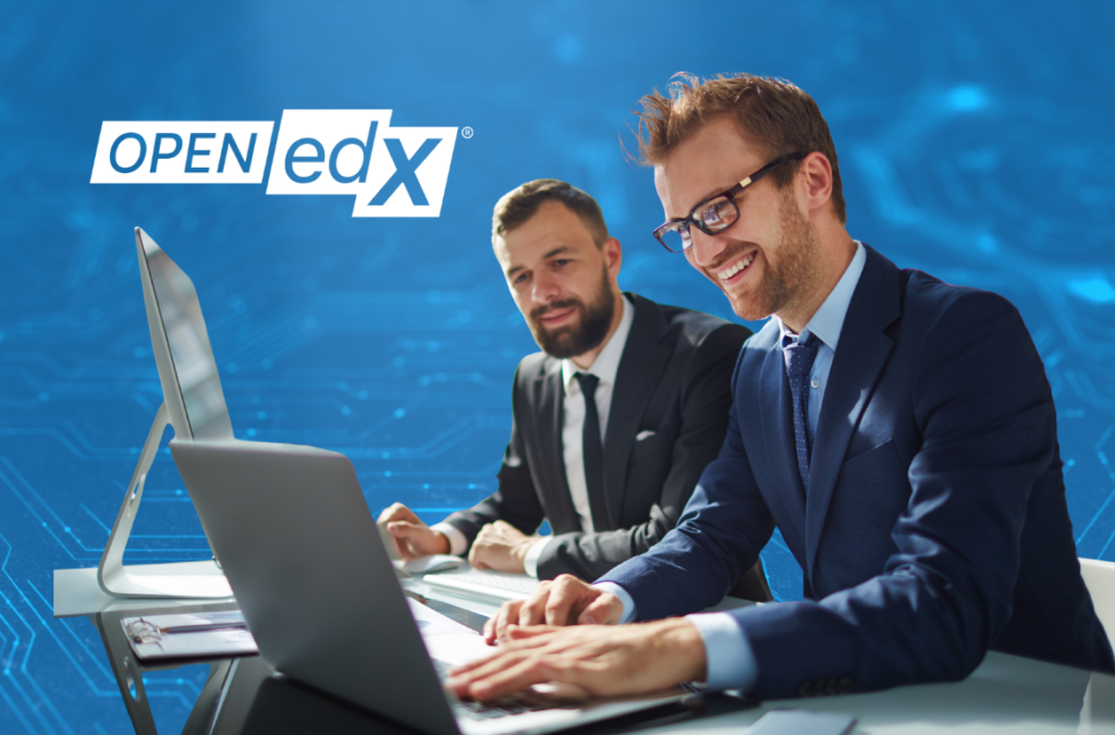 Two professionals in business attire working together on laptops in front of a blue digital circuit background with the Open edX logo.
