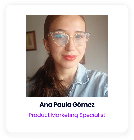 A headshot of Ana Paula Gómez wearing glasses and a denim shirt.